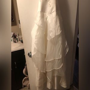 A custom made wedding dress I had personally made and never wore for a wedding,
